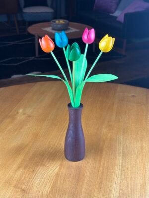 Mixed colour tulips with purple 'cool' vase