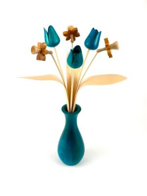 Turquoise new shape tulips / nat yew daffodils with vase